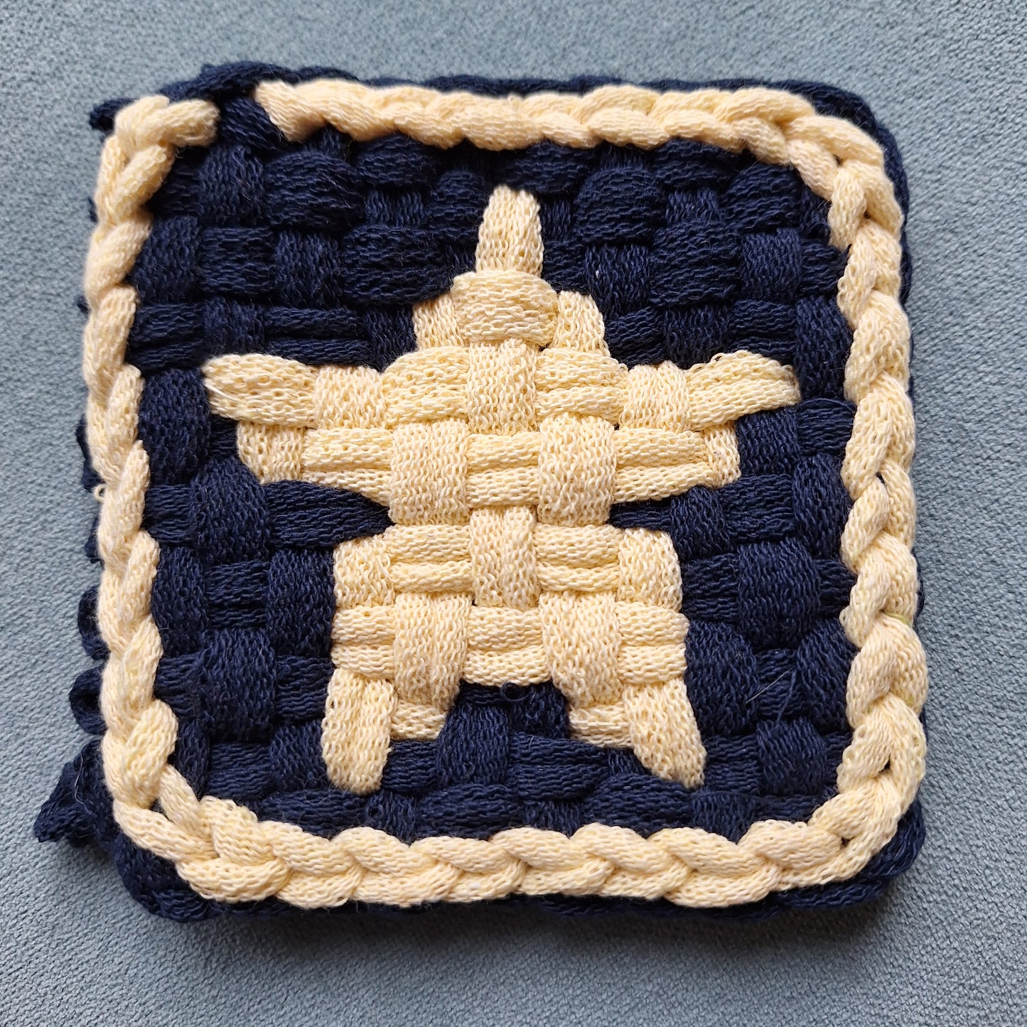 double weave star potholder ready for binding
