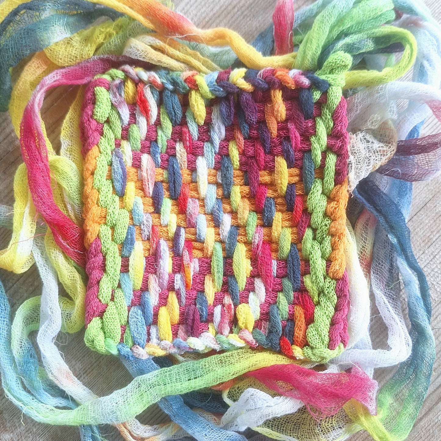Potholder woven with cotton gauze ribbon and potholder loops