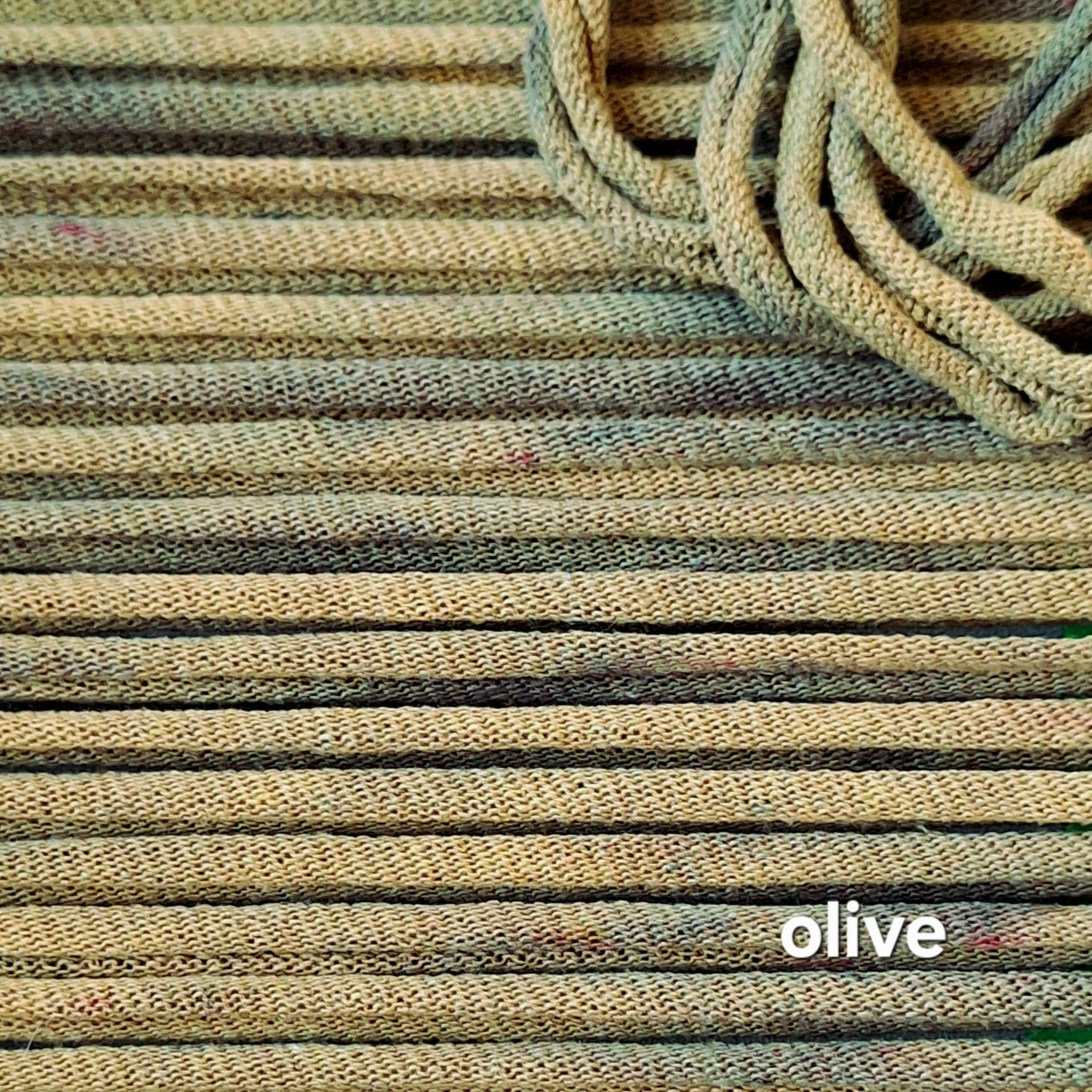 Close-up of olive green potholder loops with 'olive' text overlay