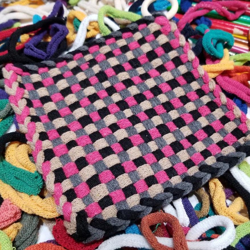 Woven potholder on a bed of loops