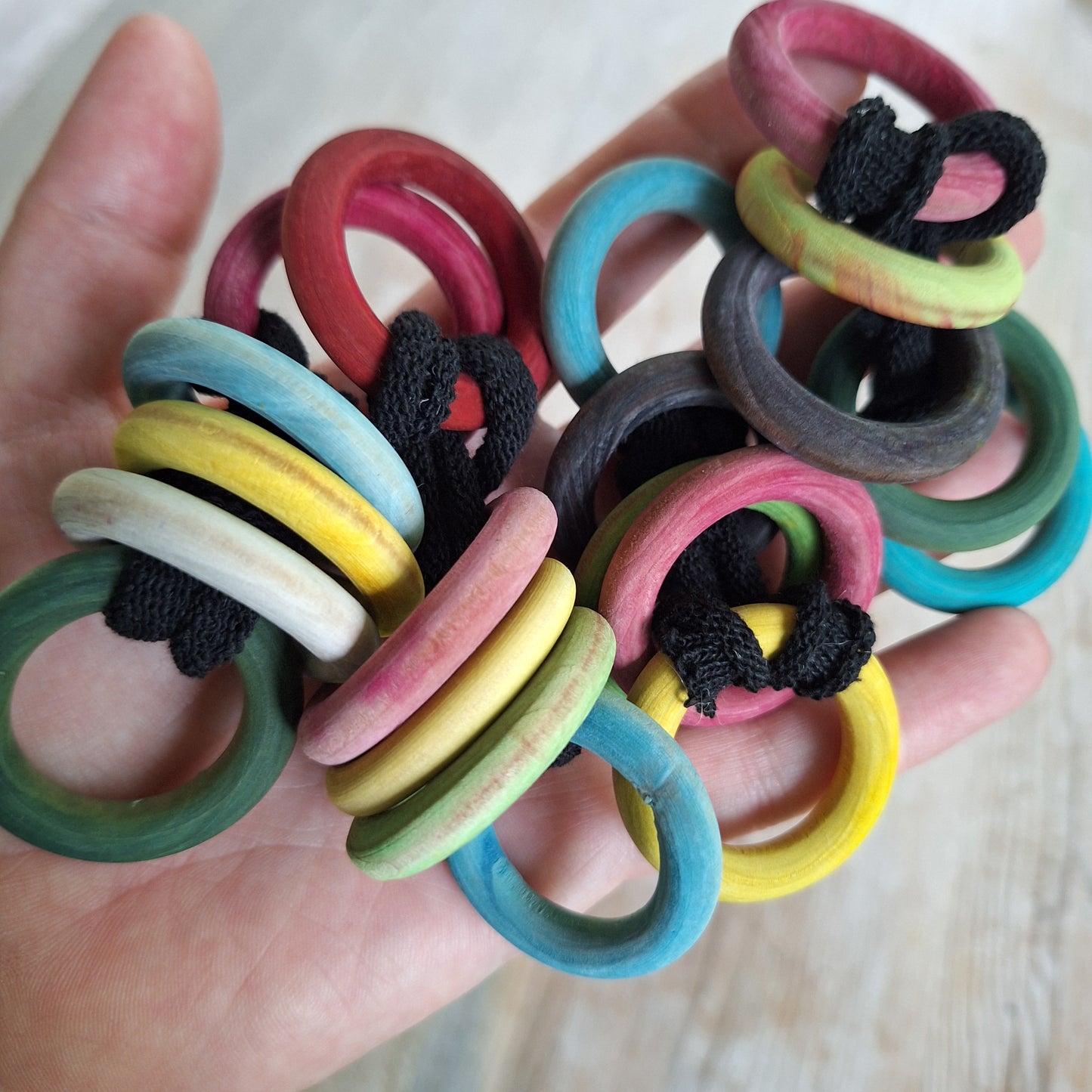 multicolored wooden potholder rings