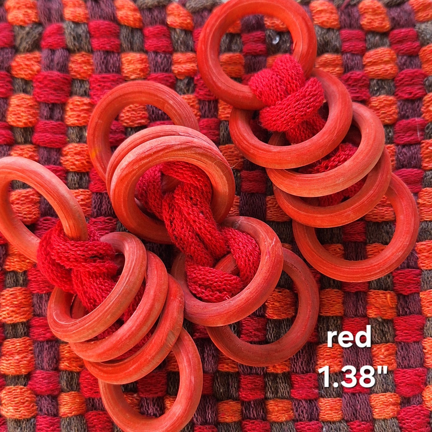 sets of red wooden potholder rings