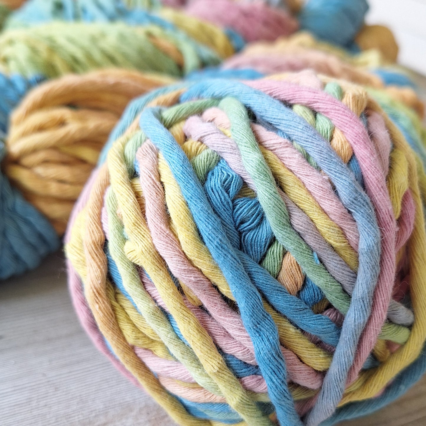 Ball of pastel-colored 'sidewalk chalk' soft cotton cord for weaving