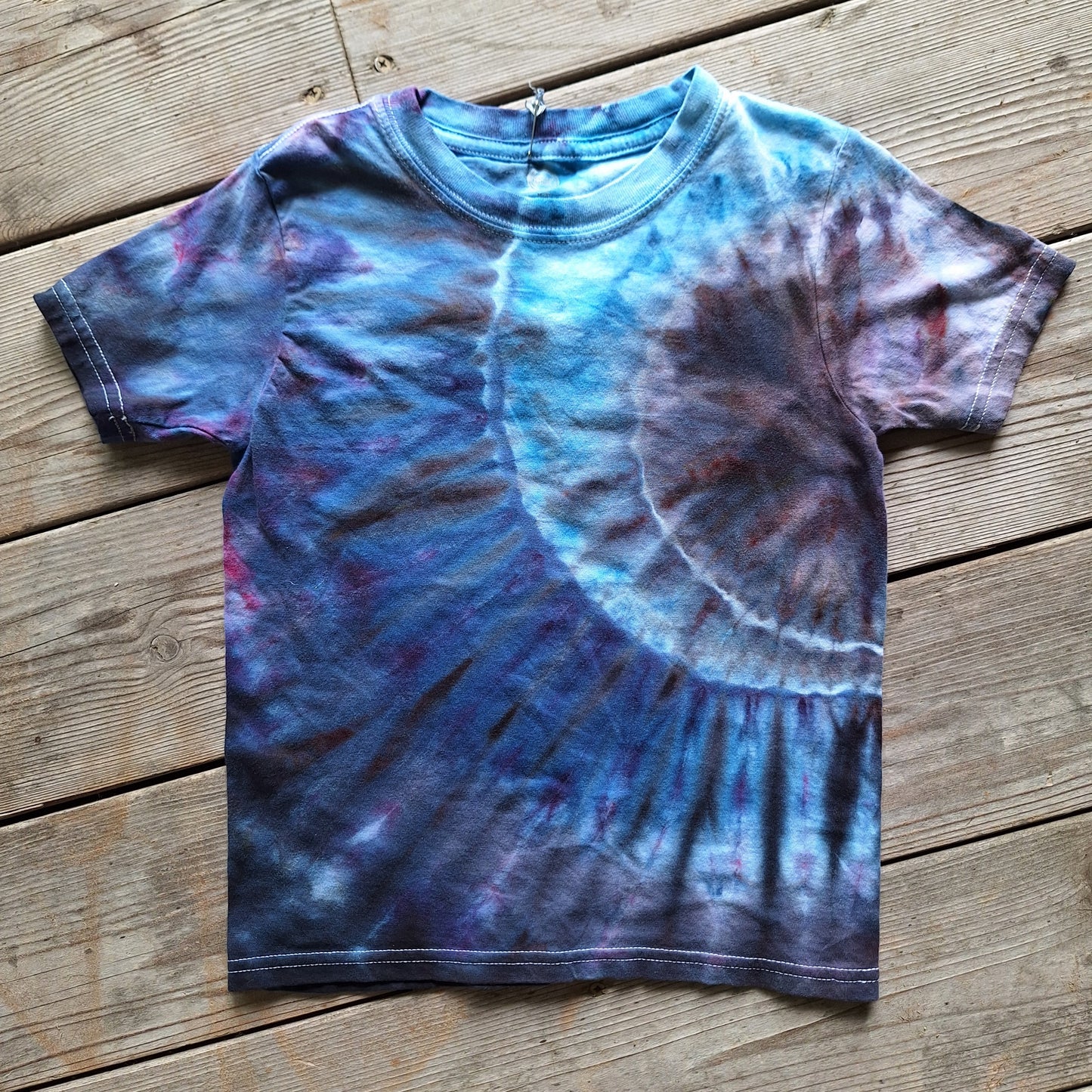blue tie dye tee shirt with a mooon design