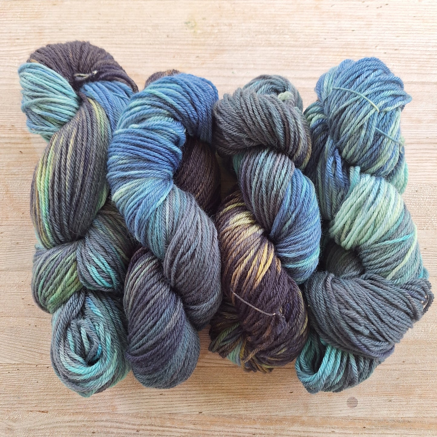 blue and brown worsted weight hand dyed wool yarn