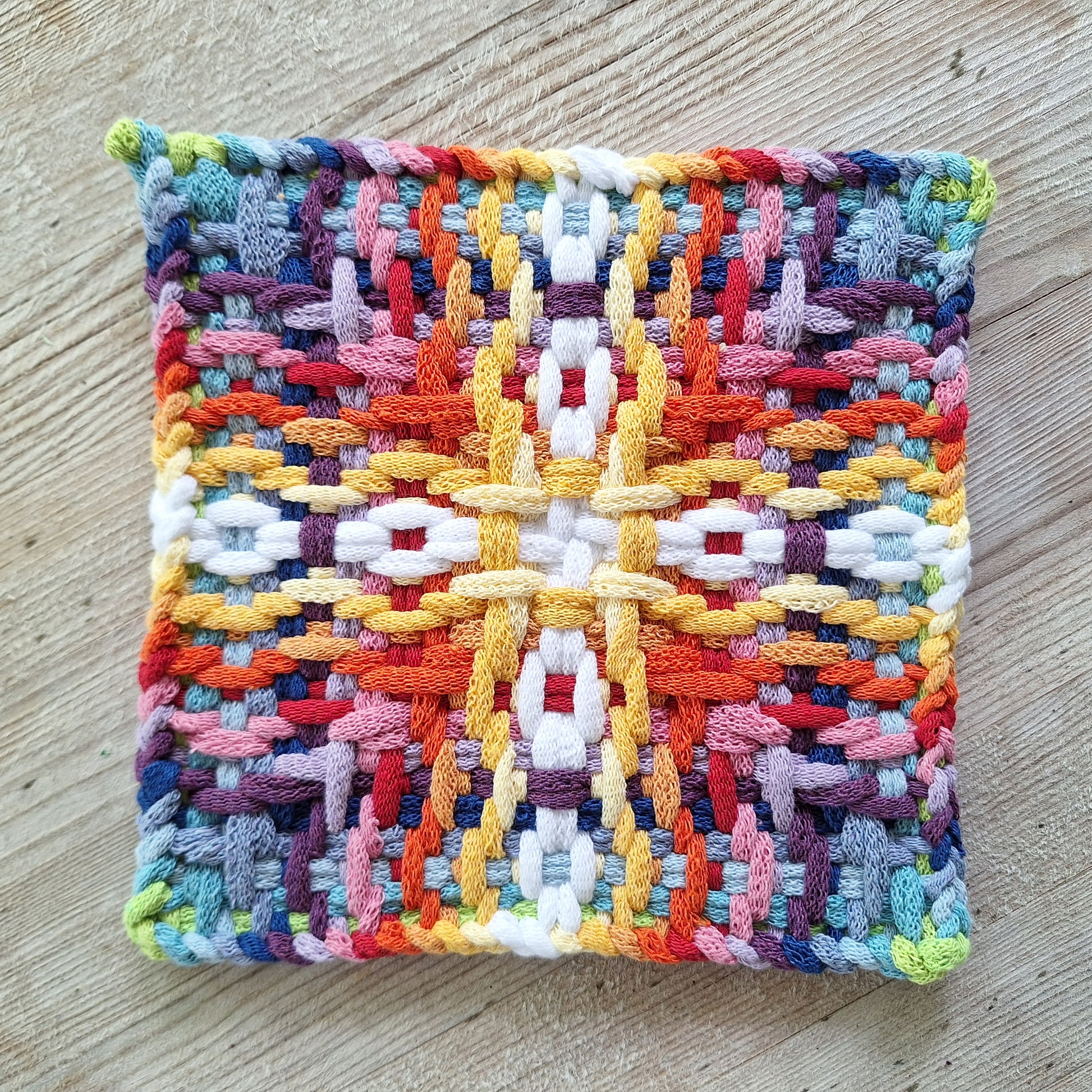multicolor chunky daisy chain cross woven potholder