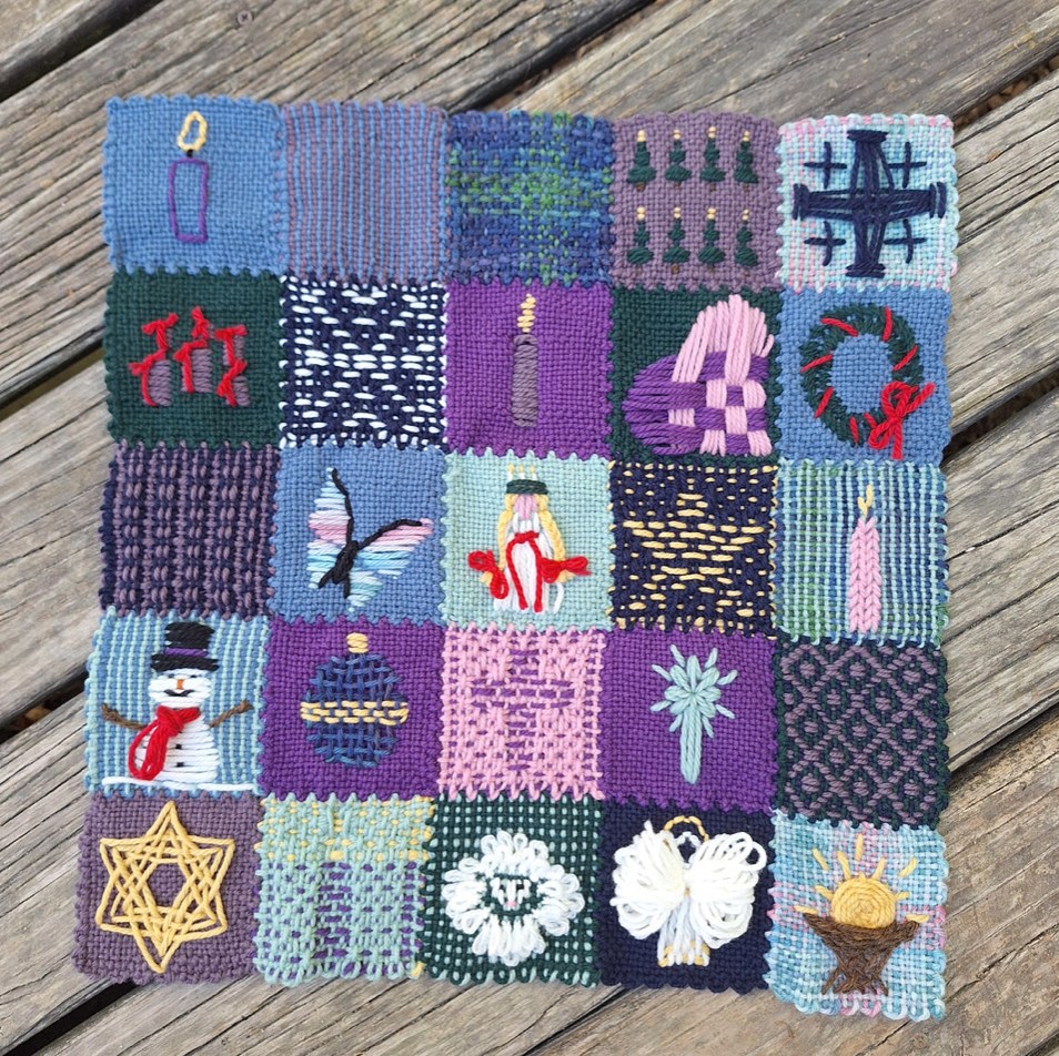 Woven sampler with 25 advent / Christmas themed squares