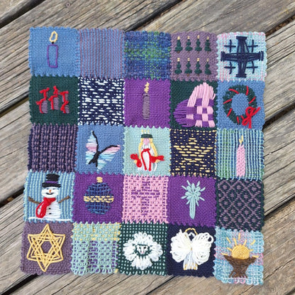 Woven sampler with 25 advent / Christmas themed squares