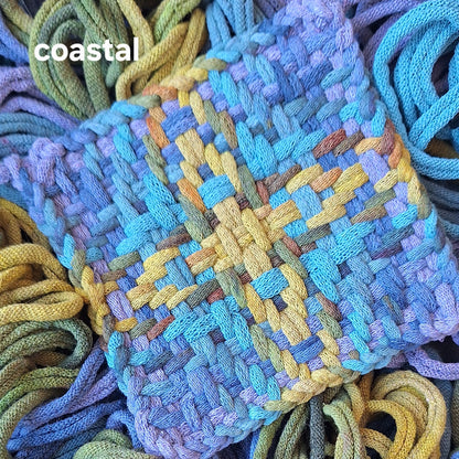 chunky star handwoven potholder in a blue and green colorway