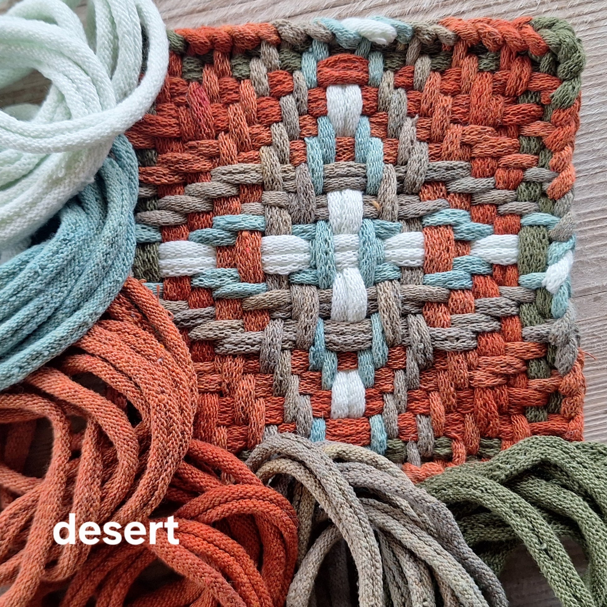 handwoven potholder  in spice, neutral, and light blue