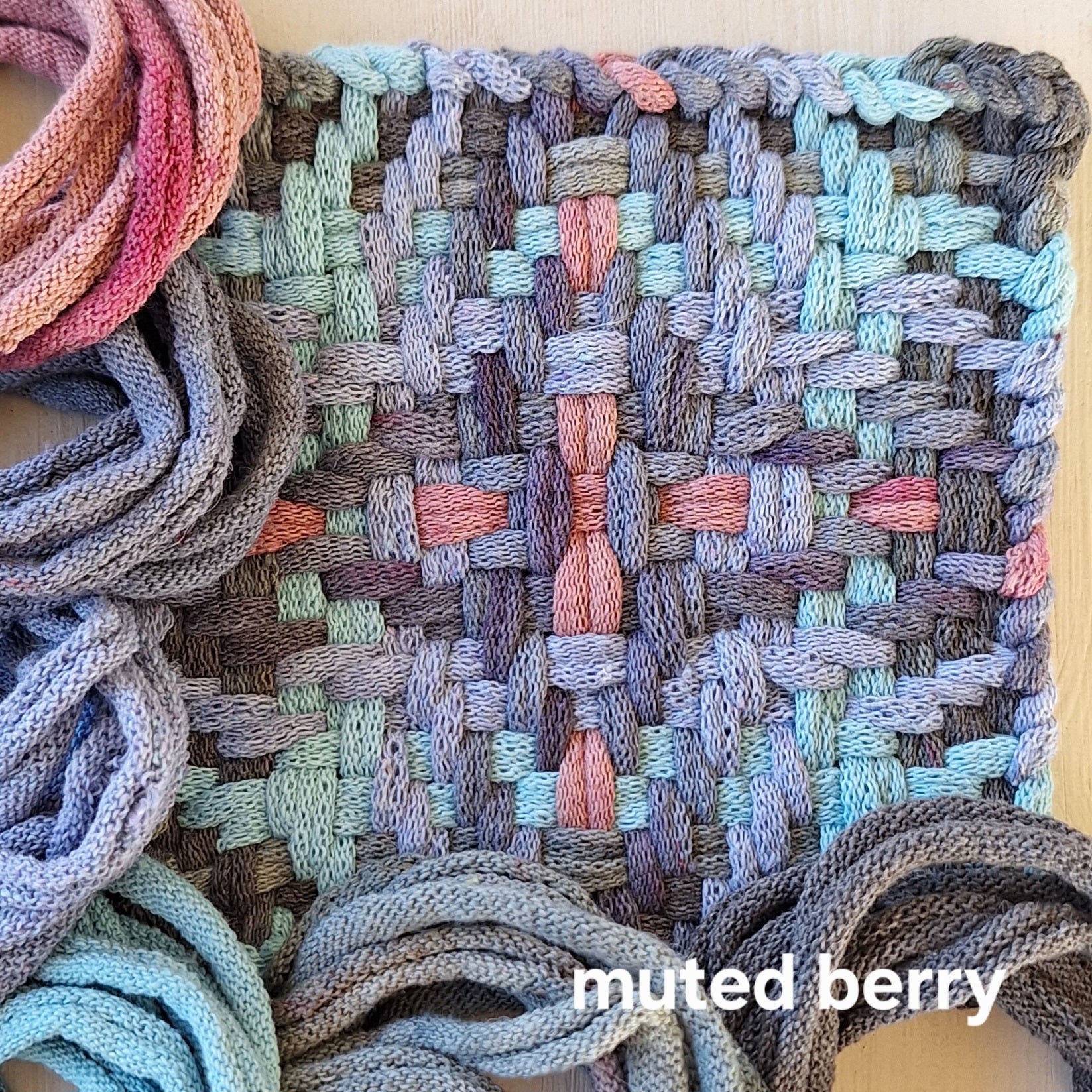 closeup of handwoven potholder with loops