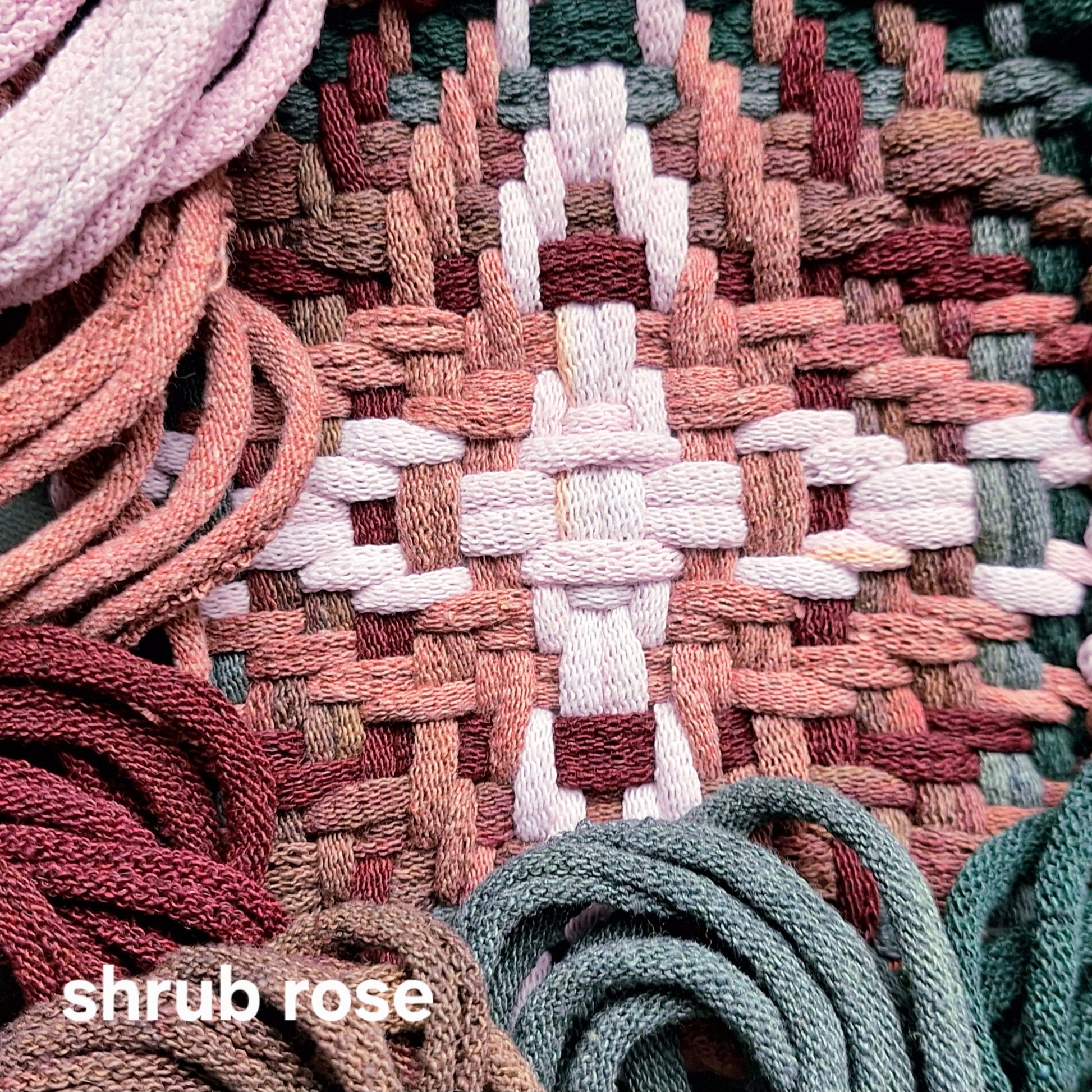 close up of chunky star weaving pattern in shrub rose colorway