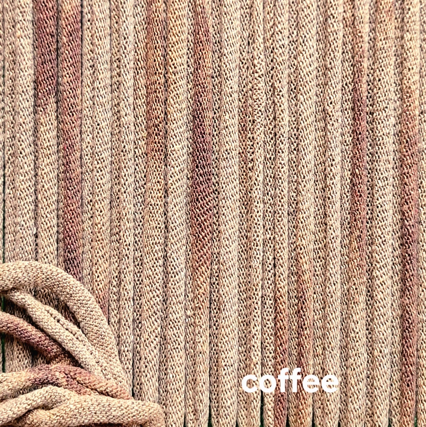 Close-up of light brown potholder loops