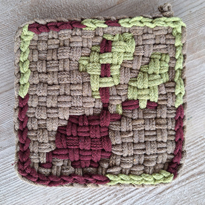 double weave potholder with a red beet design