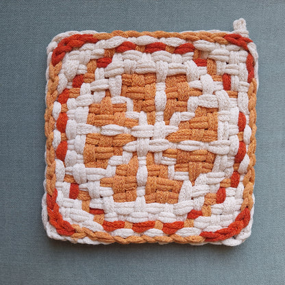 Double Weave potholder with an orange slice graphic design