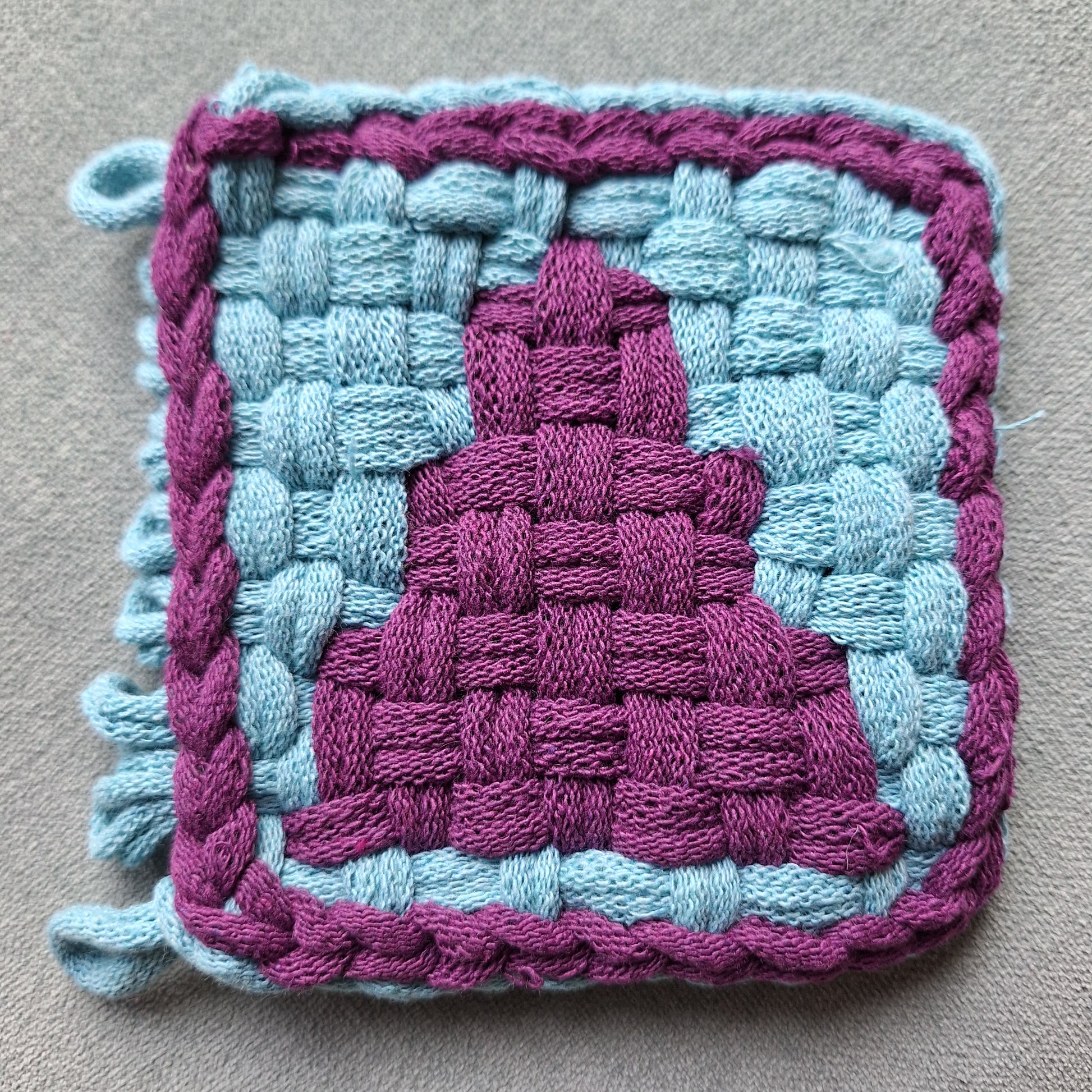 double weave triangle potholder ready for binding