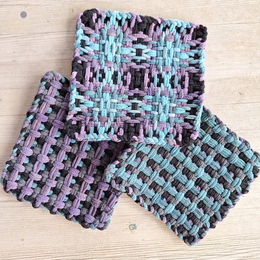 A selection of handwoven potholders by MNPlatypus