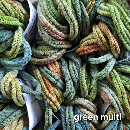 A mix of green potholder loops hand dyed by MNPlatypus
