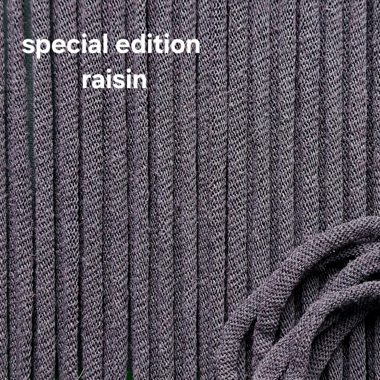 Close-up of cotton potholder loops fabric with 'special edition raisin' text