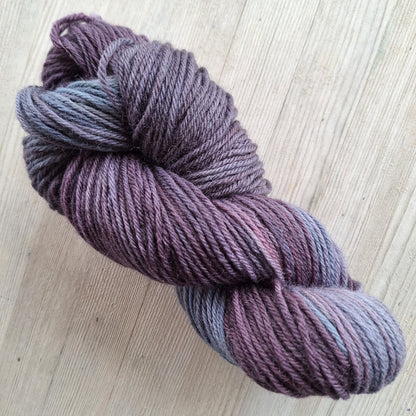 Deep purple and blue/grey yarn