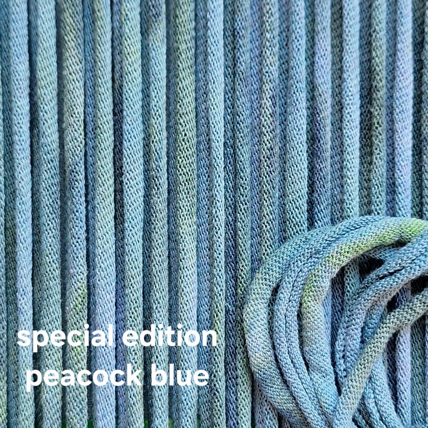 Close-up of peacock blue potholder loops with 'special edition peacock blue' text.