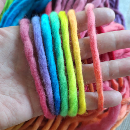 Hand wrapped with hand dyed pencil roving