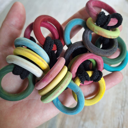 multicolored wooden potholder rings