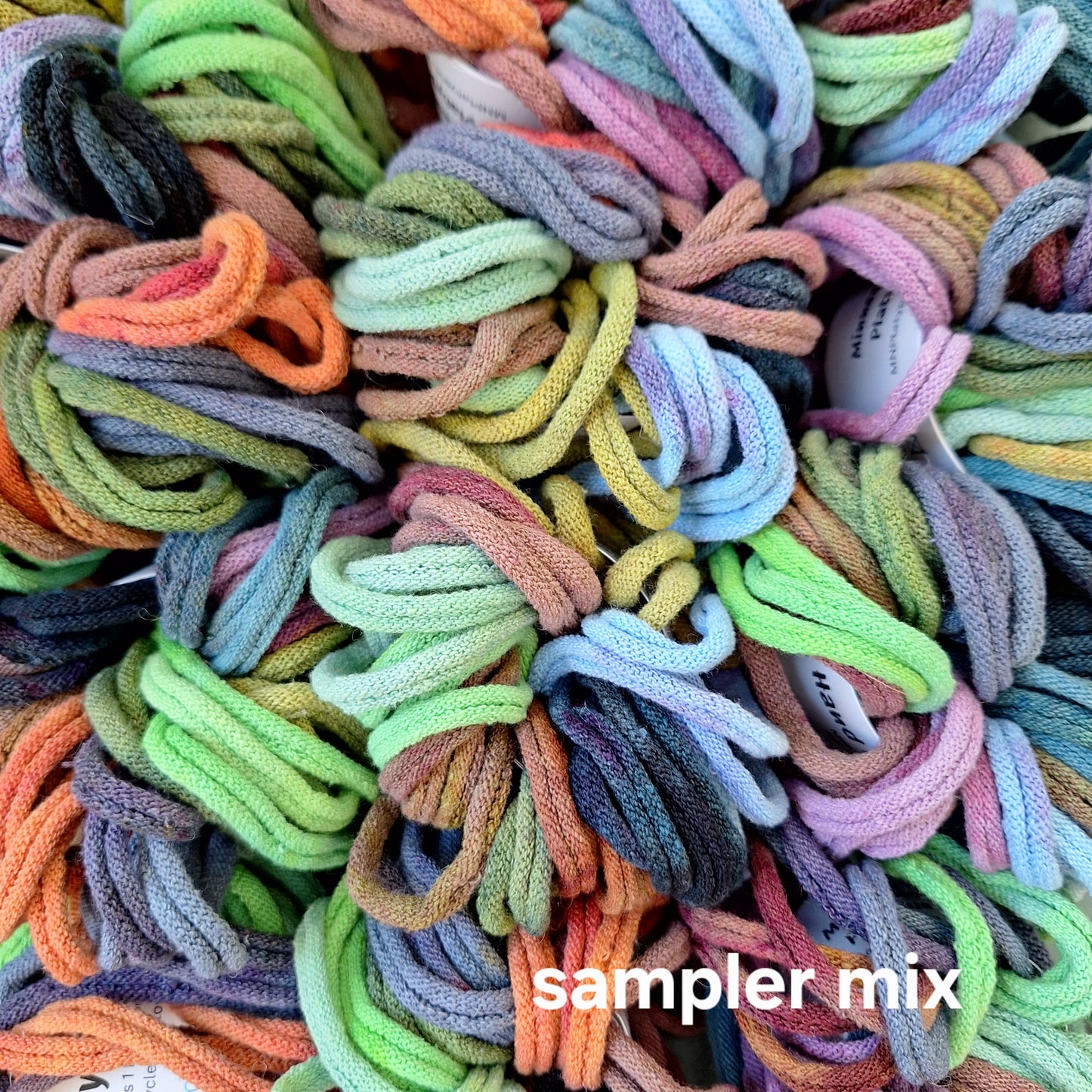 mixed assortment of hand dyed potholder loops