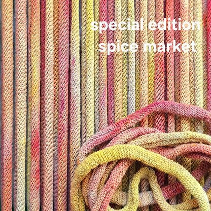 Colorful potholder loops with 'special edition spice market' text overlay