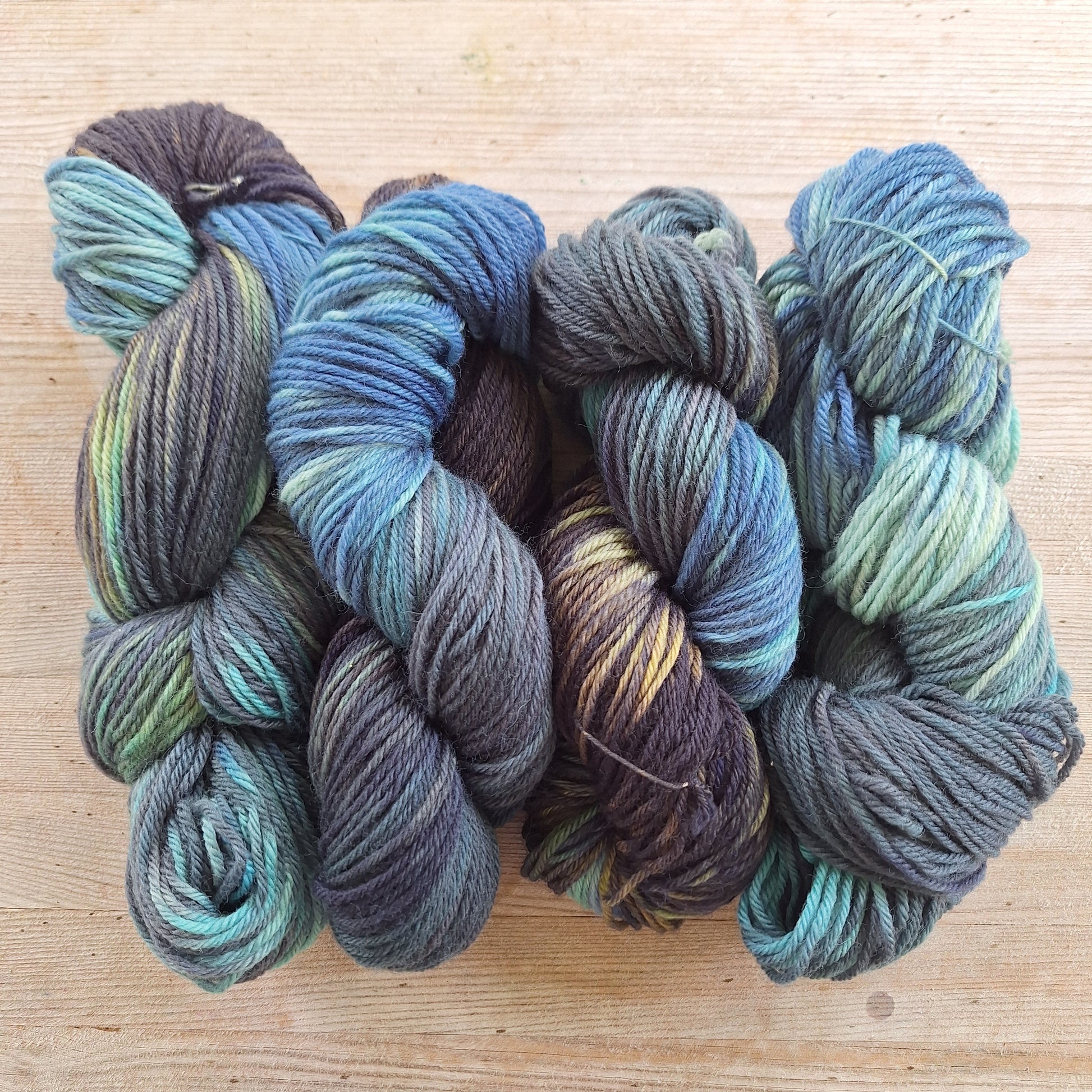 blue and brown worsted weight hand dyed wool yarn